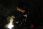 Technicians Working in Workshop